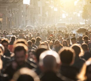 Blurred crowd of unrecognizable at the street