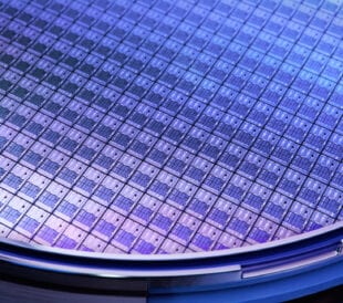 Macro Shot of a Silicon Wafer with Computer Chips during