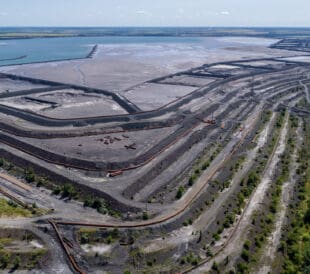 Tailings dump are the materials left over after the process of separating the valuable fraction from the uneconomic fraction gangue of an ore aerial view.